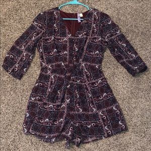 purple patterned romper